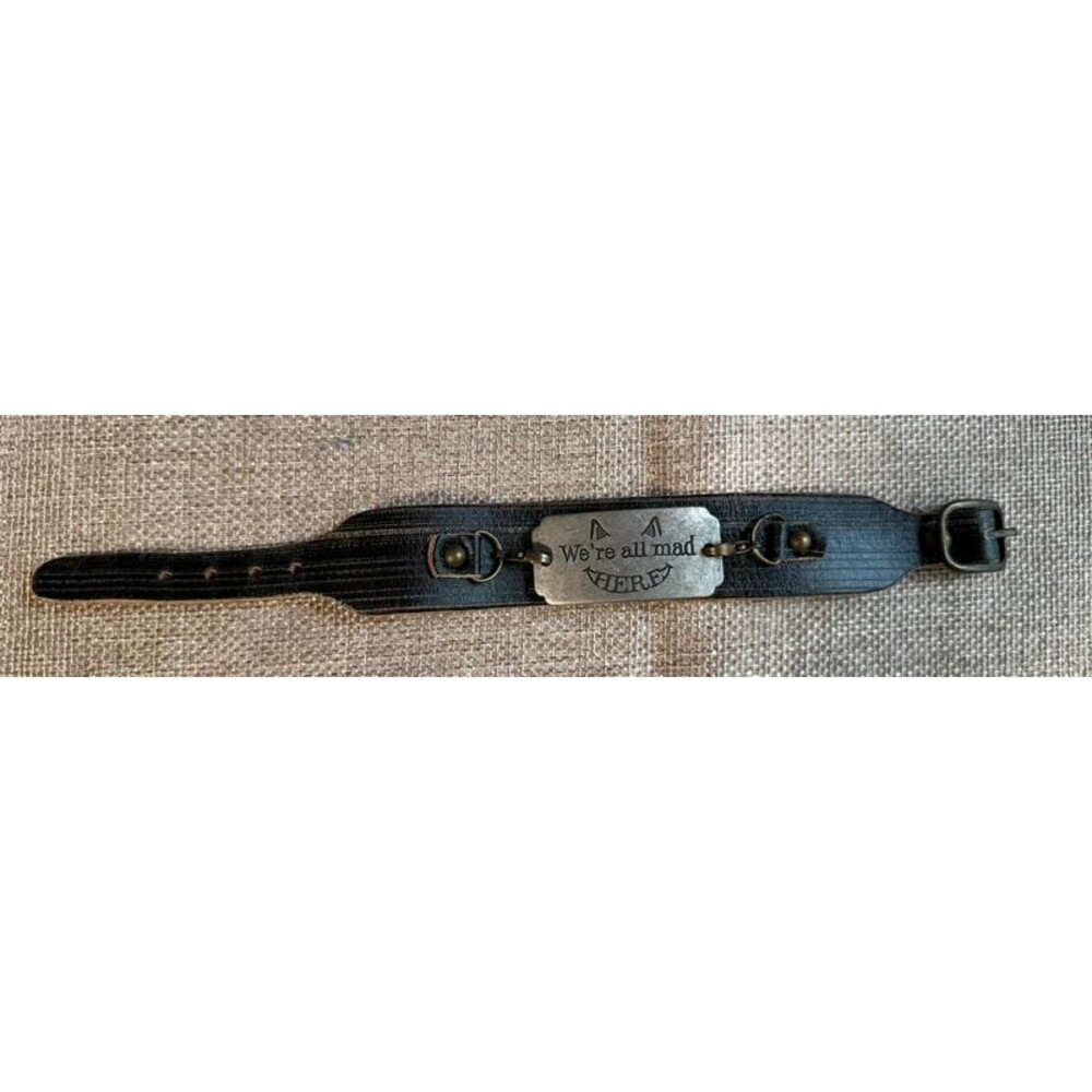 Disney Couture Alice in Wonderland We're All Mad Here Leather ID Bracelet Cuff